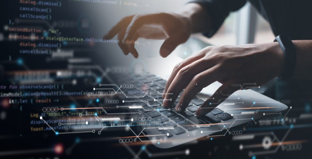 Hands typing code to deploy AWS infrastructure with secure cloud configuration.