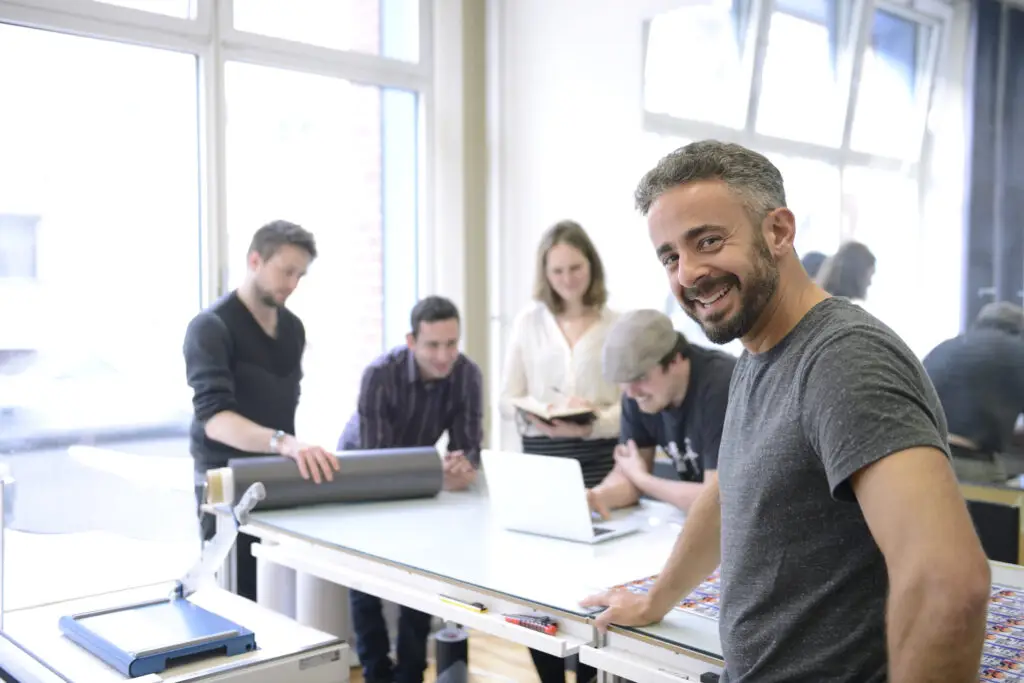 Stock image showing professionals in discussion, symbolizing AWS cloud infrastructure planning.